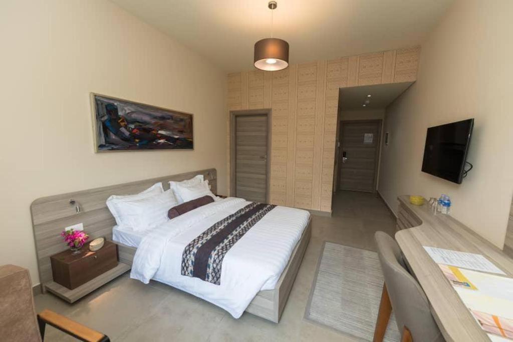 Roots Hotel Apartments Abidjan Esterno foto